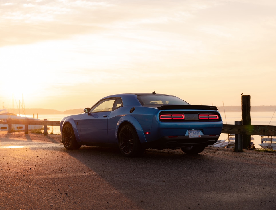 back of a blue Dodge Challenger Hellcat Coupe