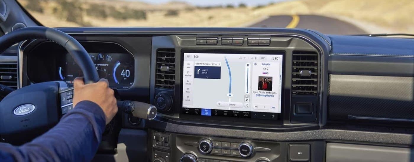 A close up shows the infotainment screen in a 2023 Ford F-250.