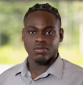 Staff member Emanuel Melon from ID_dfb798