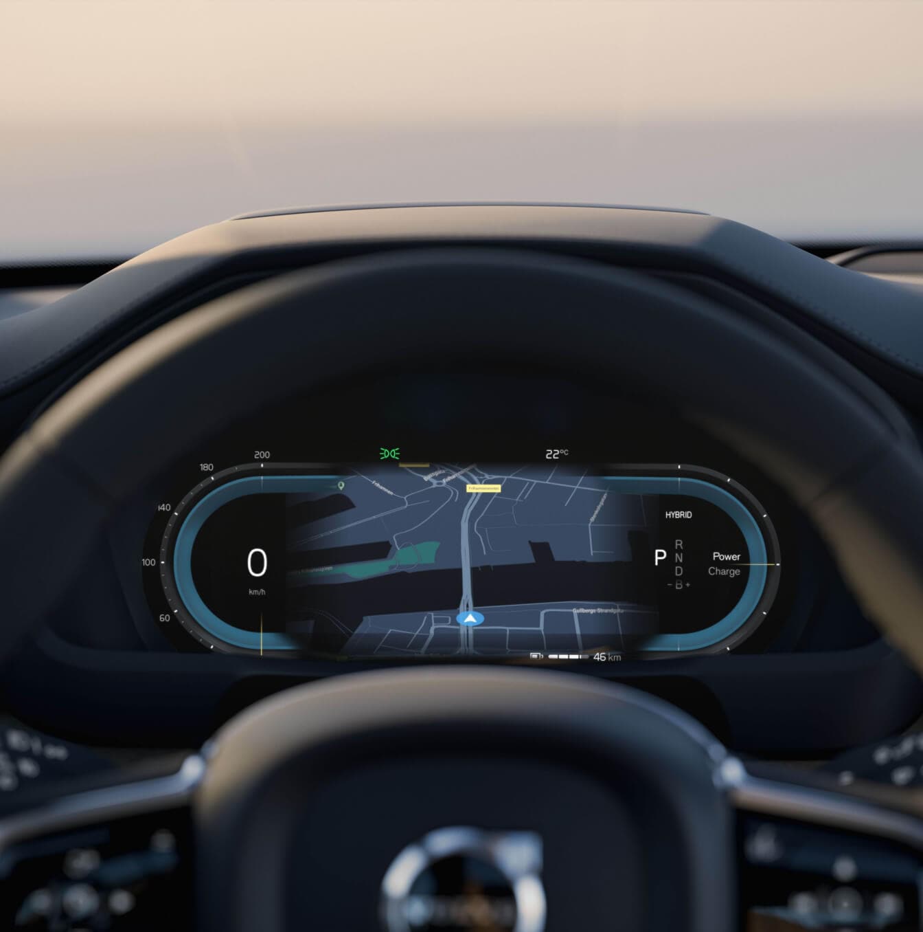 Close-up view of a Volvo XC90 digital driver display showing a navigation map behind the steering wheel.
