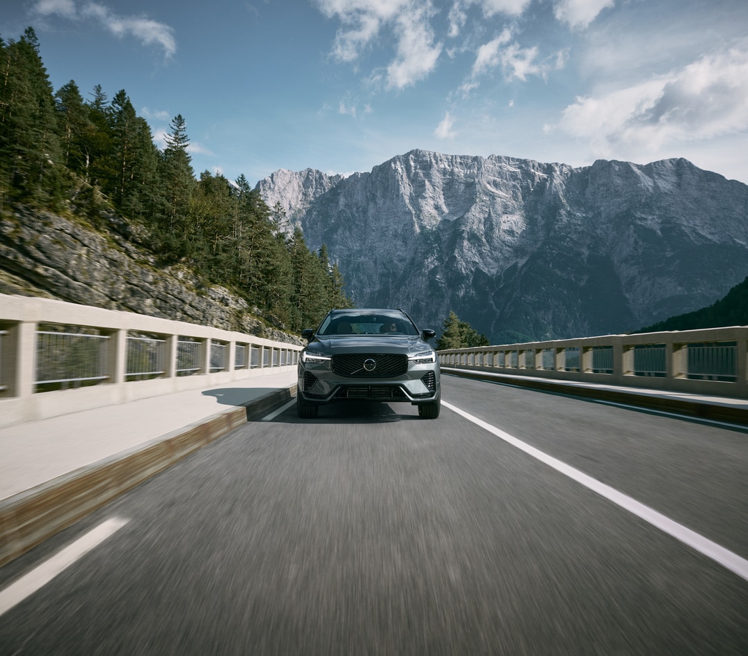  Person cheerfully signing documents.
