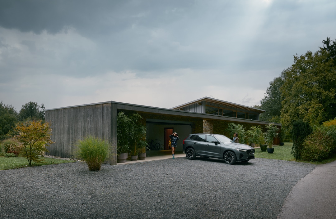  Person cheerfully signing documents.