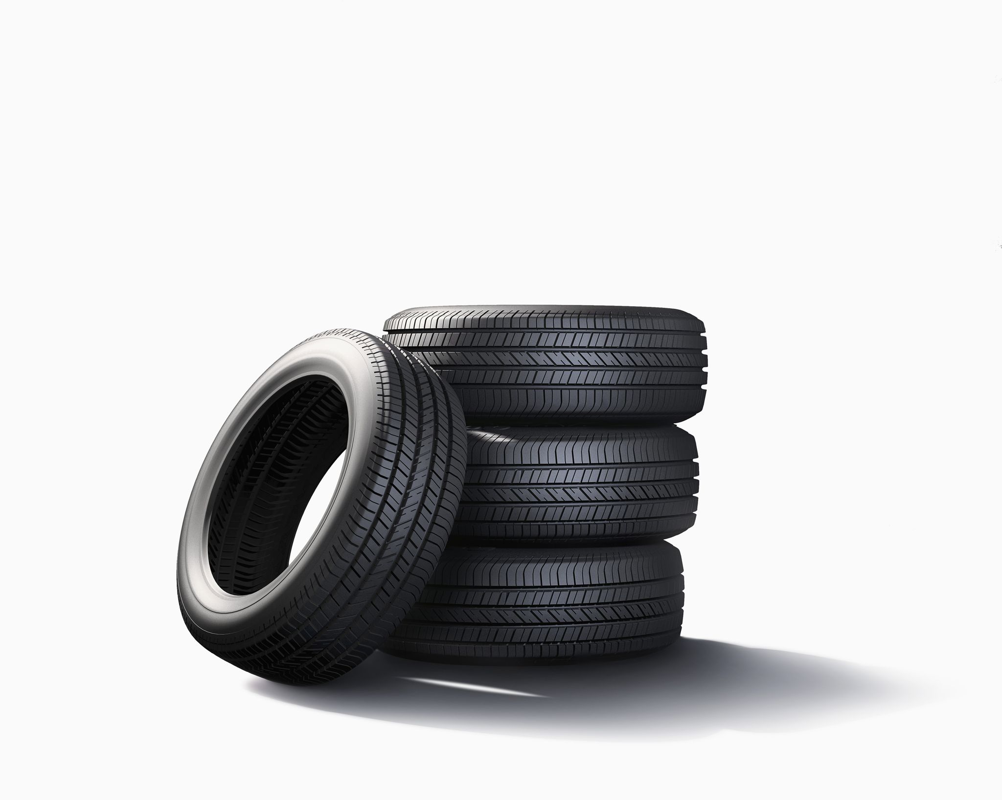 pile-of-tires-on-white-background-royalty-free-image-672151801-1561751929.jpg