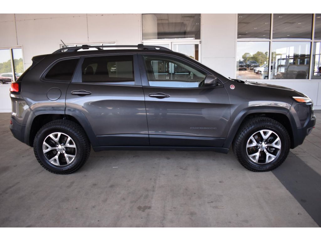 Used 2015 Jeep Cherokee Trailhawk with VIN 1C4PJMBB8FW594067 for sale in Athens, AL