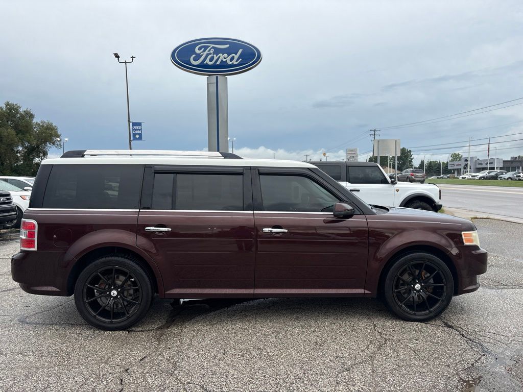 Used 2009 Ford Flex SEL with VIN 2FMDK52C19BA08244 for sale in Alma, MI
