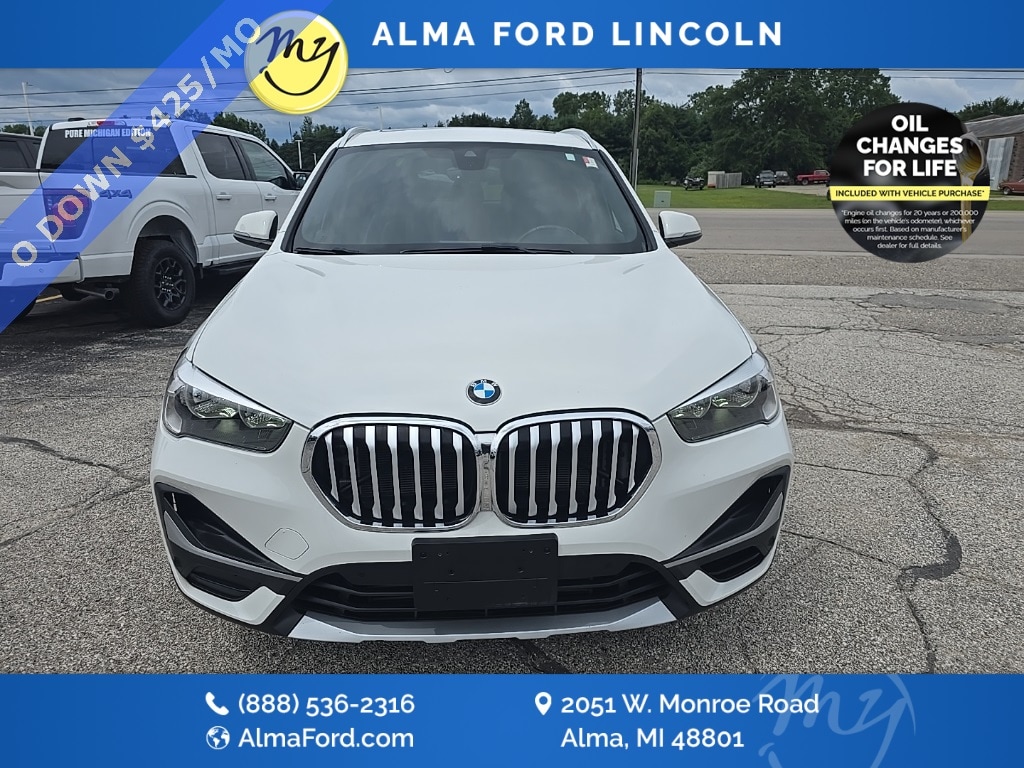 Used 2021 BMW X1 28i with VIN WBXJG7C01M5S98283 for sale in Alma, MI