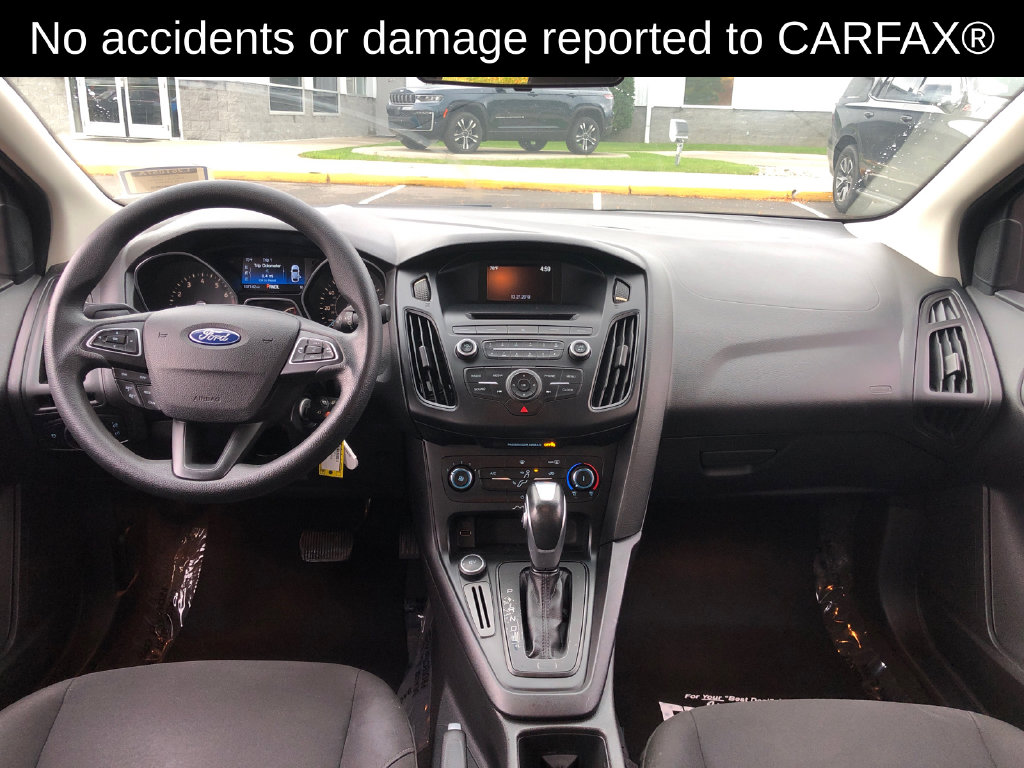 Used 2015 Ford Focus SE with VIN 1FADP3F25FL292409 for sale in Lapeer, MI