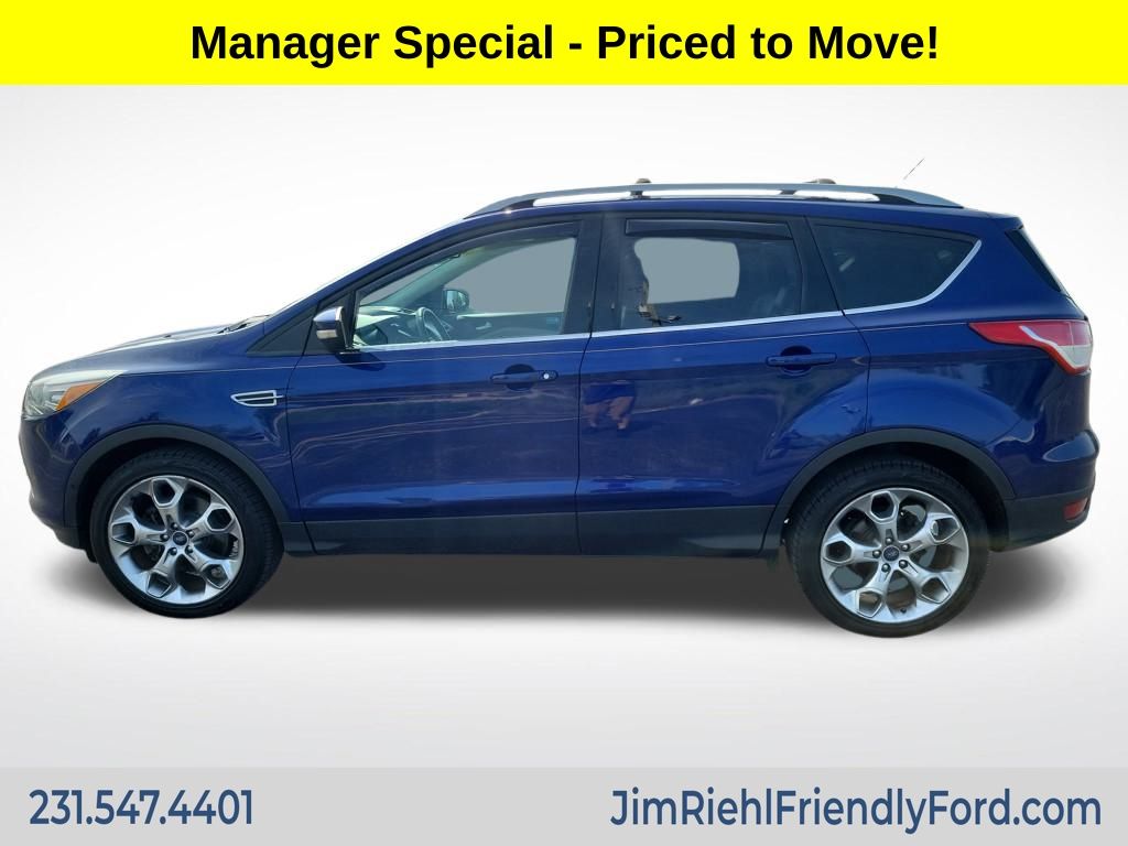 Used 2014 Ford Escape Titanium with VIN 1FMCU9JX4EUB11728 for sale in Charlevoix, MI