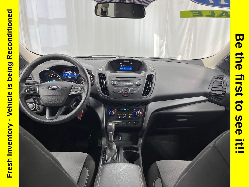 Used 2017 Ford Escape SE with VIN 1FMCU9GD3HUC23986 for sale in Charlevoix, MI