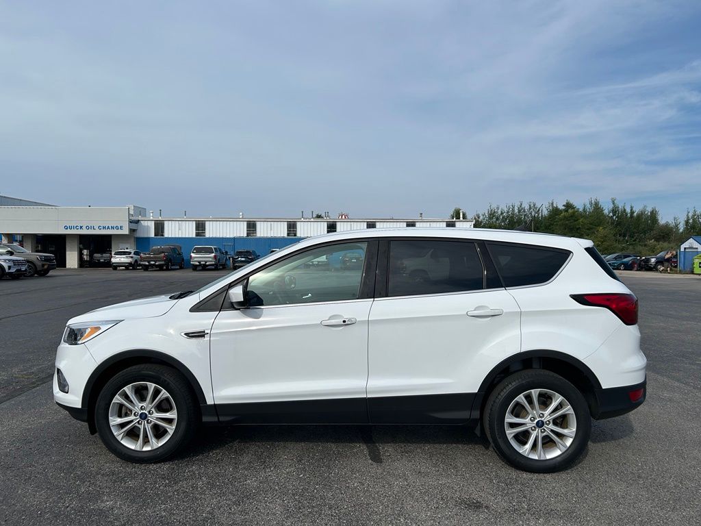 Used 2019 Ford Escape SE with VIN 1FMCU9GDXKUC34393 for sale in Charlevoix, MI