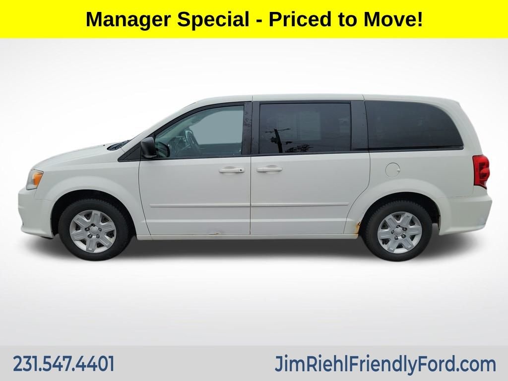 Used 2012 Dodge Grand Caravan SE with VIN 2C4RDGBG7CR333711 for sale in Charlevoix, MI
