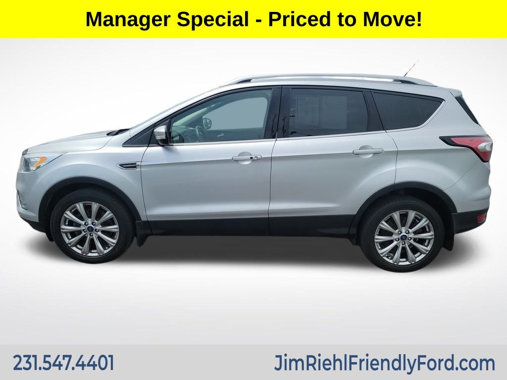 Used 2018 Ford Escape Titanium with VIN 1FMCU9J93JUB74590 for sale in Charlevoix, MI