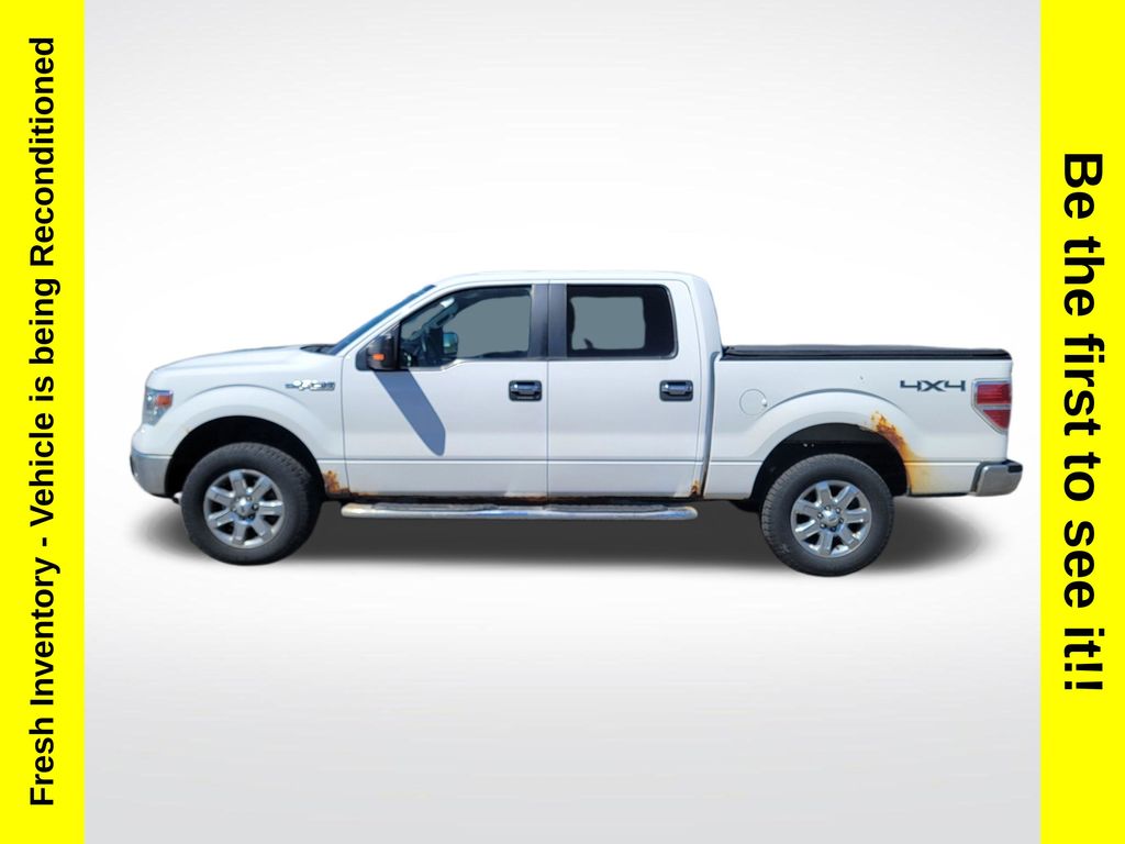 Used 2014 Ford F-150 XLT with VIN 1FTFW1EF6EFC67191 for sale in Charlevoix, MI