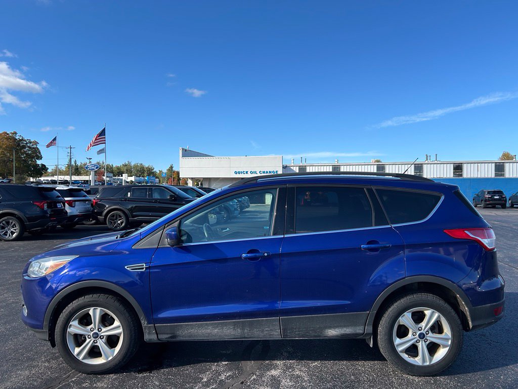 Used 2016 Ford Escape SE with VIN 1FMCU9GX5GUC24288 for sale in Charlevoix, MI