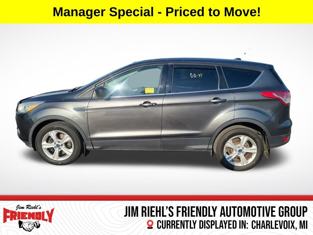 Used 2015 Ford Escape SE with VIN 1FMCU9G9XFUB77176 for sale in Charlevoix, MI