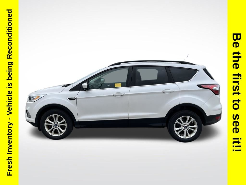 Used 2018 Ford Escape SEL with VIN 1FMCU9HD7JUD28339 for sale in Charlevoix, MI