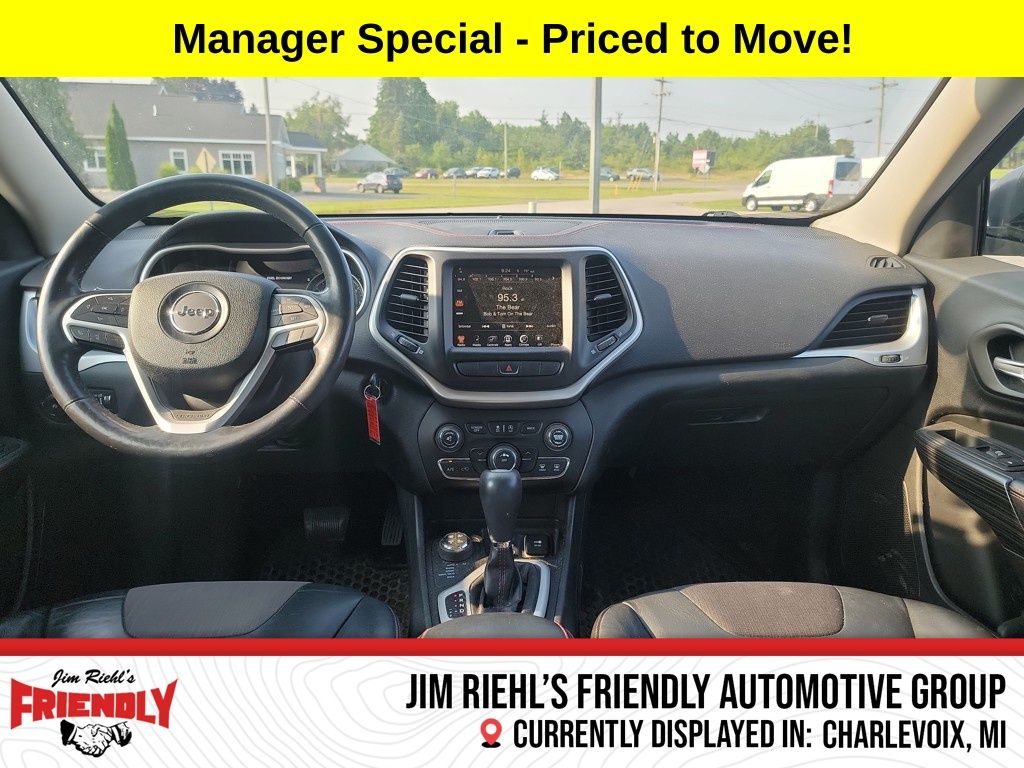 Used 2015 Jeep Cherokee Trailhawk with VIN 1C4PJMBSXFW538471 for sale in Charlevoix, MI