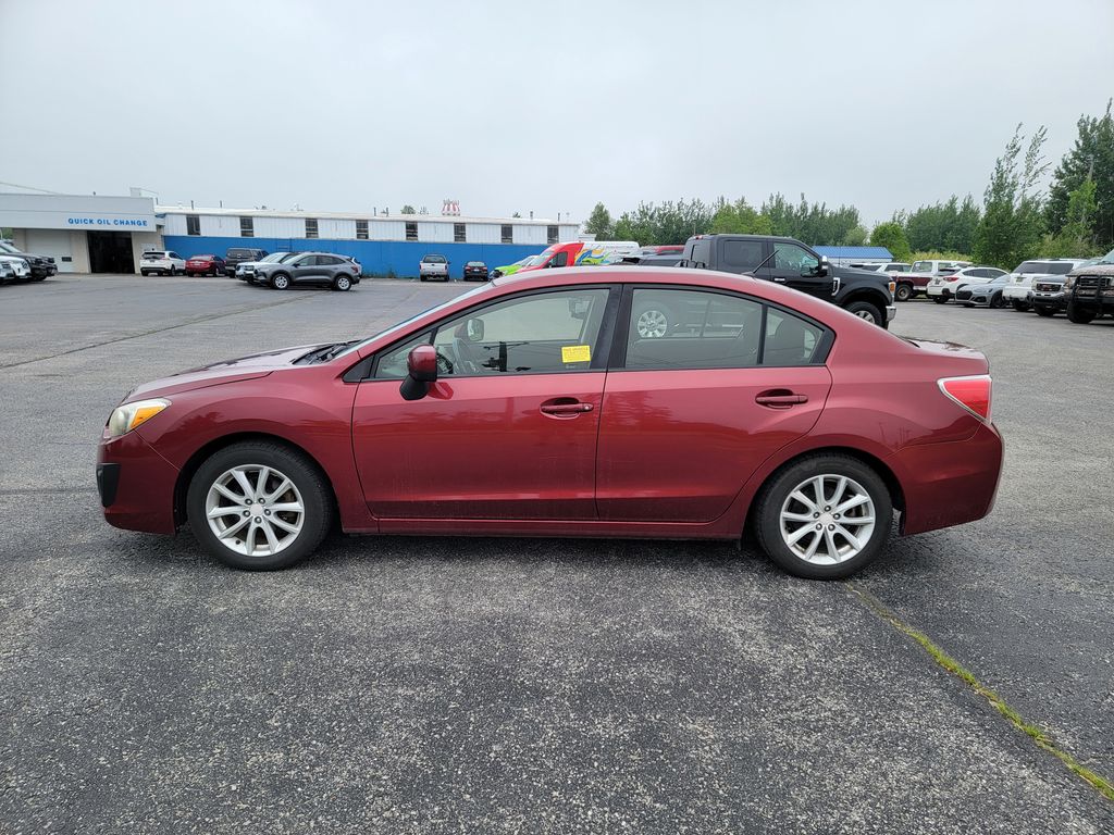 Used 2014 Subaru Impreza 2.0I Premium with VIN JF1GJAC62EH022713 for sale in Charlevoix, MI