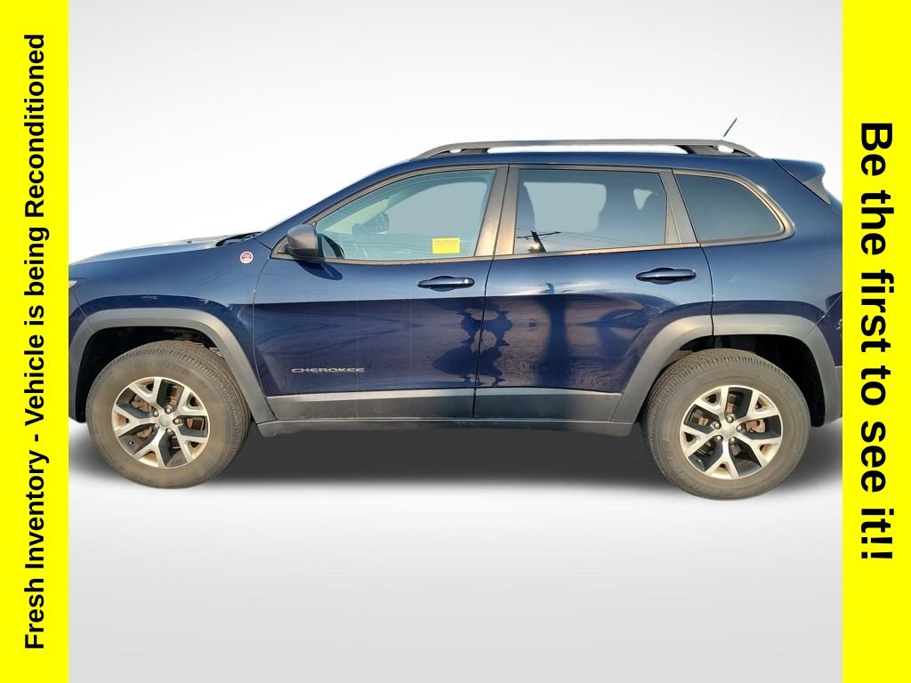 Used 2015 Jeep Cherokee Trailhawk with VIN 1C4PJMBSXFW538471 for sale in Charlevoix, MI
