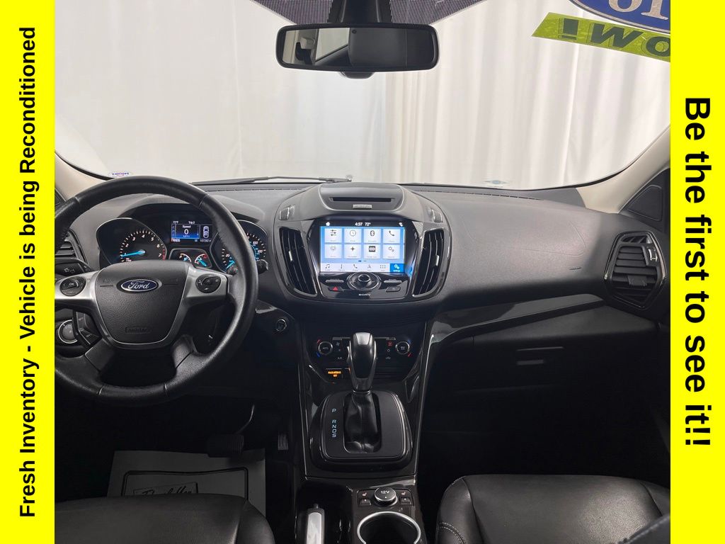 Used 2016 Ford Escape Titanium with VIN 1FMCU0J97GUB44027 for sale in Charlevoix, MI