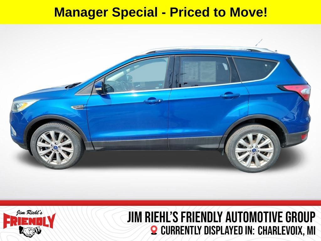 Used 2017 Ford Escape Titanium with VIN 1FMCU9JD3HUD57342 for sale in Charlevoix, MI