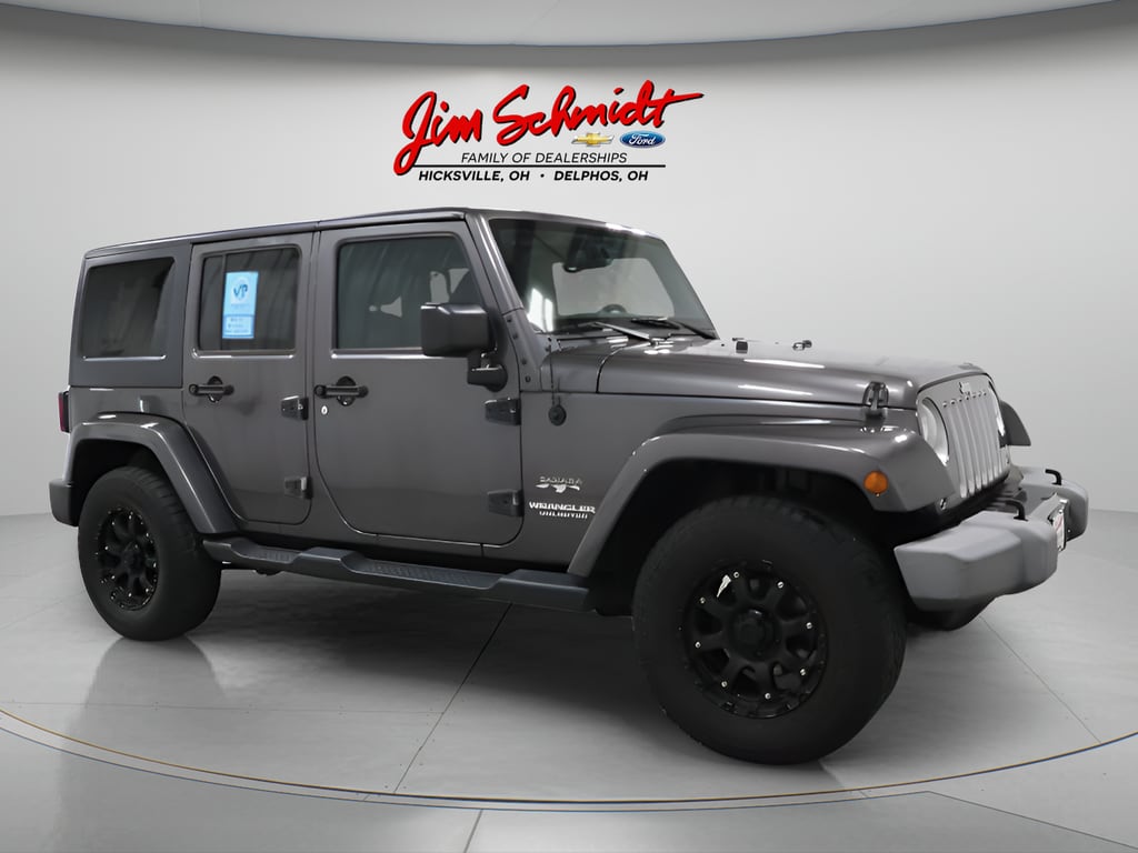 Used 2016 Jeep Wrangler Unlimited Sahara with VIN 1C4BJWEG7GL209646 for sale in Hicksville, OH