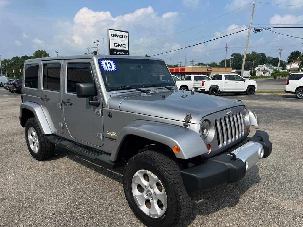 Used 2013 Jeep Wrangler Unlimited Sahara with VIN 1C4BJWEG4DL633538 for sale in Sturgis, MI