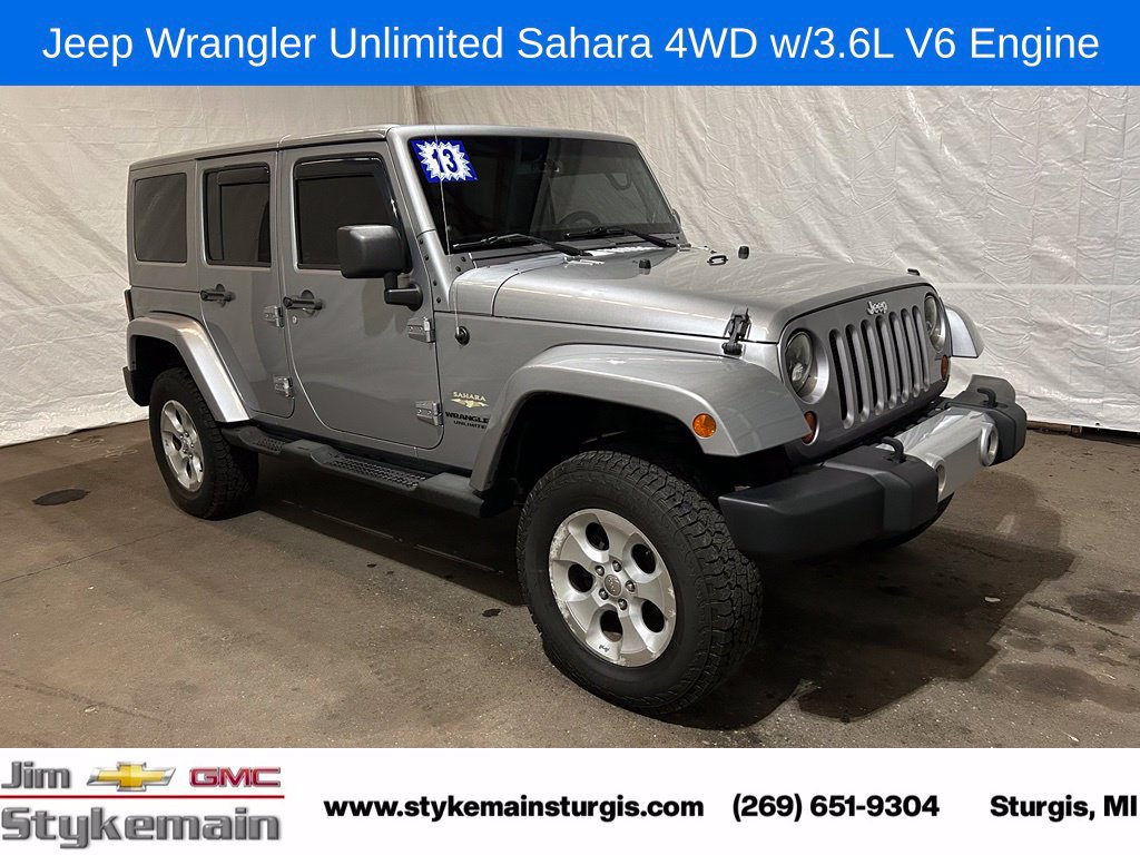 Used 2013 Jeep Wrangler Unlimited Sahara with VIN 1C4BJWEG4DL633538 for sale in Sturgis, MI