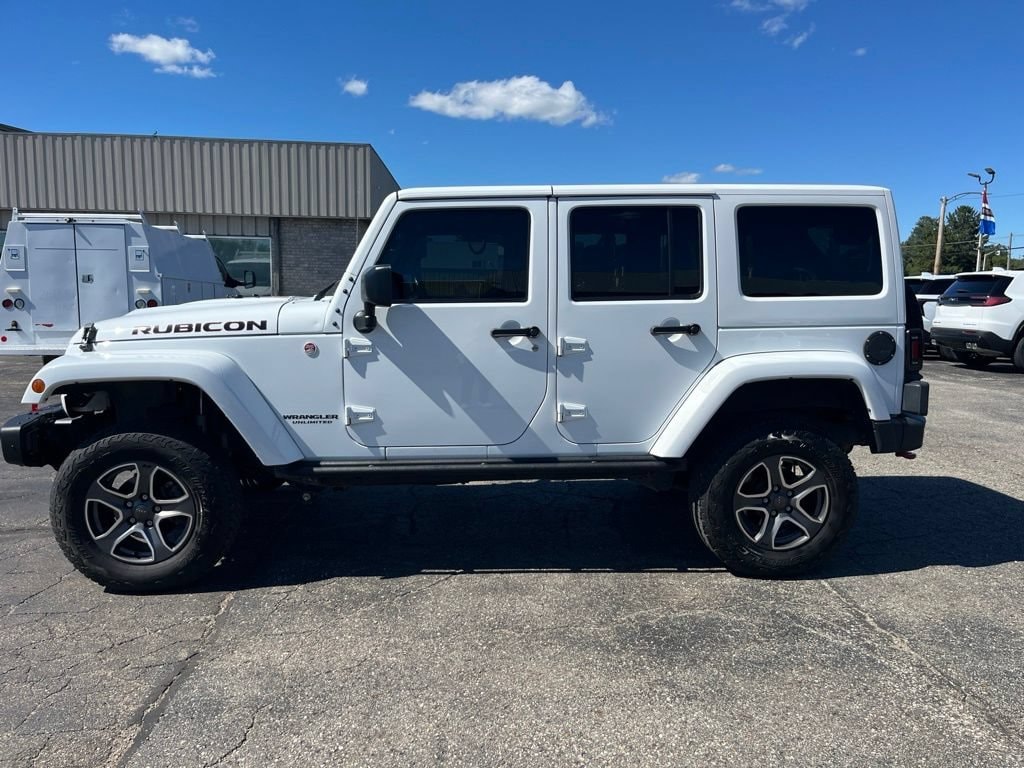 Used 2015 Jeep Wrangler Unlimited Rubicon with VIN 1C4BJWFG5FL576302 for sale in Sturgis, MI