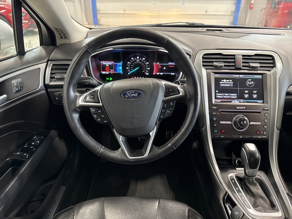 Used 2016 Ford Fusion Titanium with VIN 3FA6P0K97GR400526 for sale in Garrett, IN
