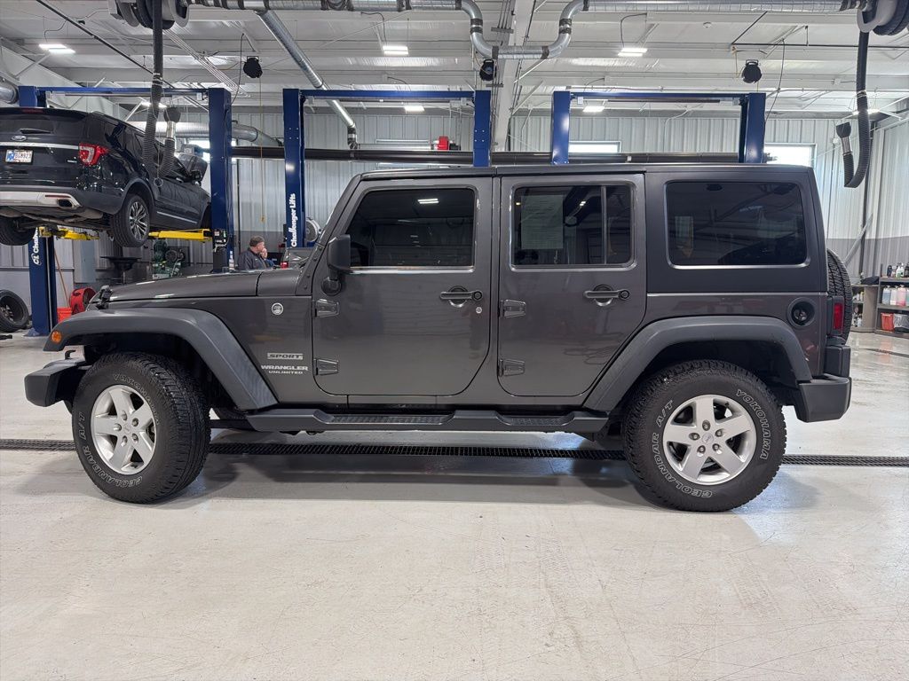Used 2016 Jeep Wrangler Unlimited Sport S with VIN 1C4BJWDG7GL188783 for sale in Garrett, IN