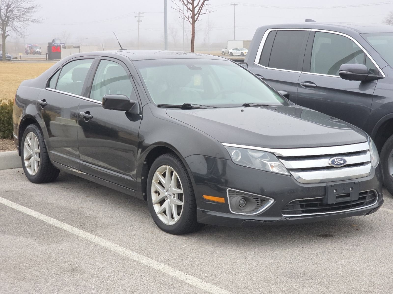 Used 2012 Ford Fusion SEL with VIN 3FAHP0JA0CR348669 for sale in Maumee, OH