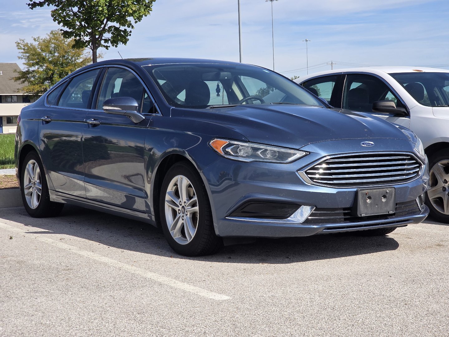 Used 2018 Ford Fusion SE with VIN 3FA6P0HD6JR256356 for sale in Maumee, OH