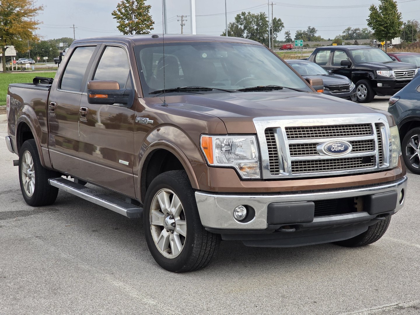 Used 2011 Ford F-150 Lariat with VIN 1FTFW1ET7BFC47341 for sale in Maumee, OH