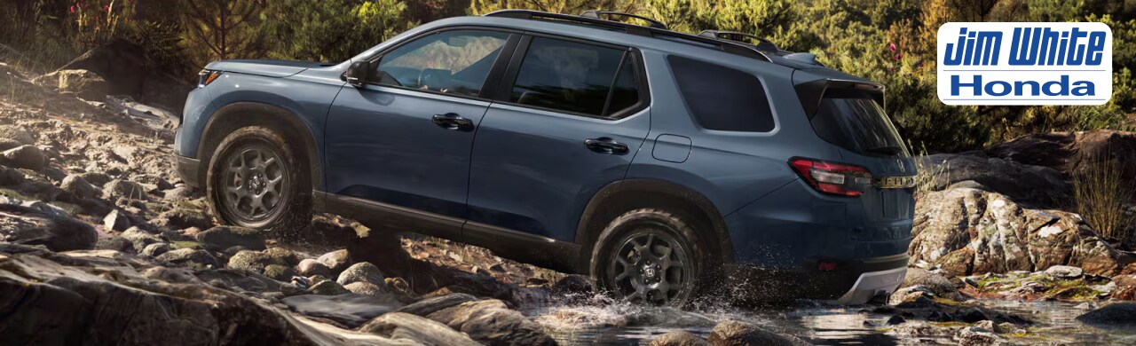 Exterior view of the 2026 Honda Pilot driving through Northwest Ohio near Toledo