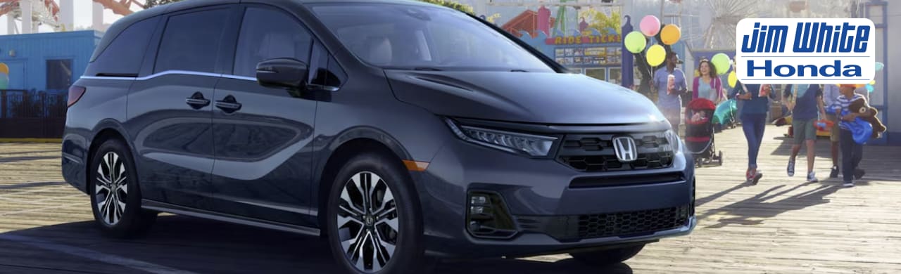 2026 Honda Odyssey EX-L parked outside Jim White Honda dealership in Maumee, OH