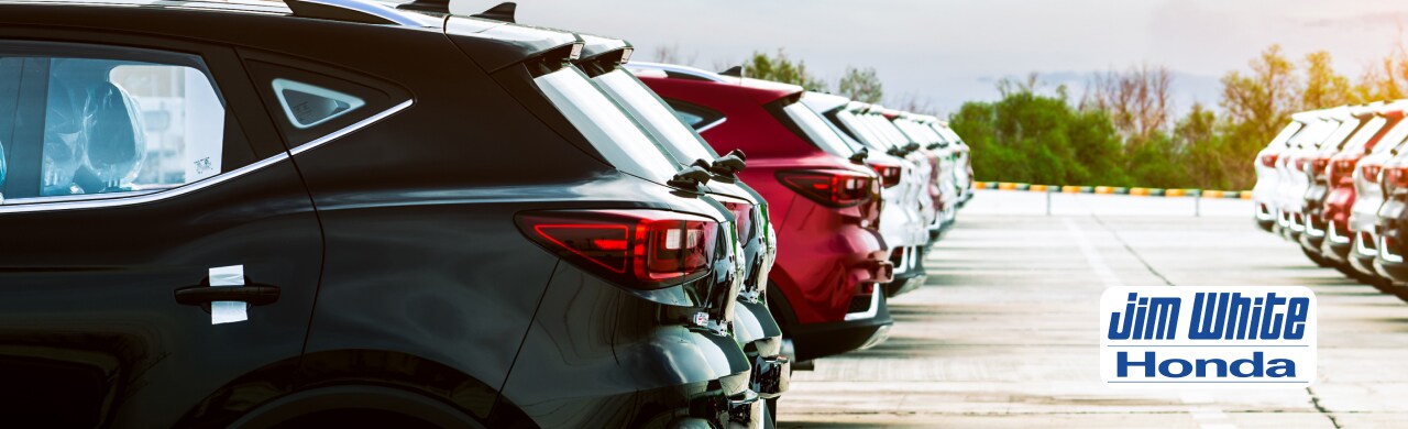 Pre-owned vehicle inventory on the lot at Jim White Honda in Maumee, Ohio