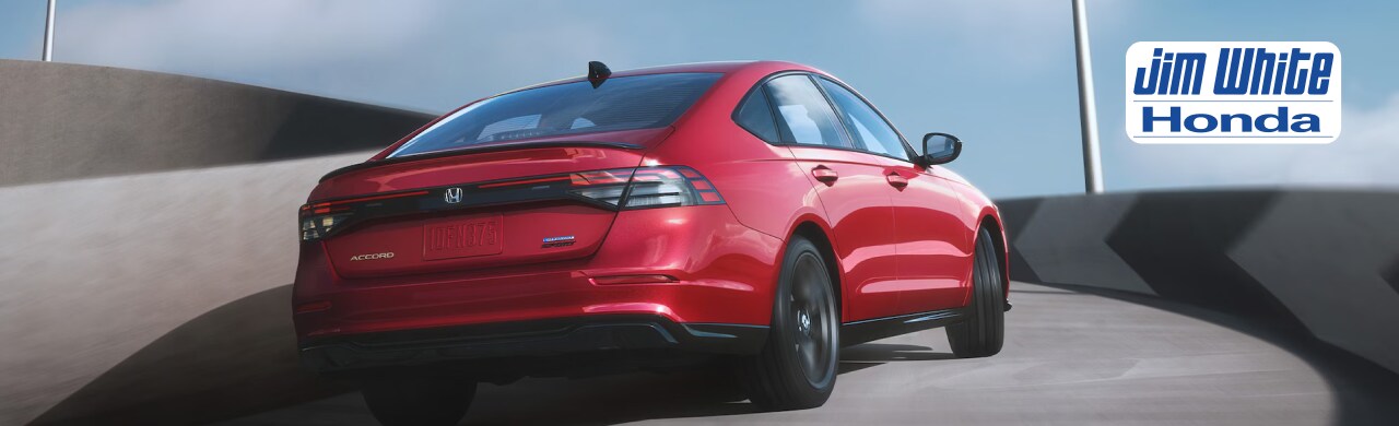 2025 Honda Accord SE driving through Maumee, Ohio, highlighting premium features