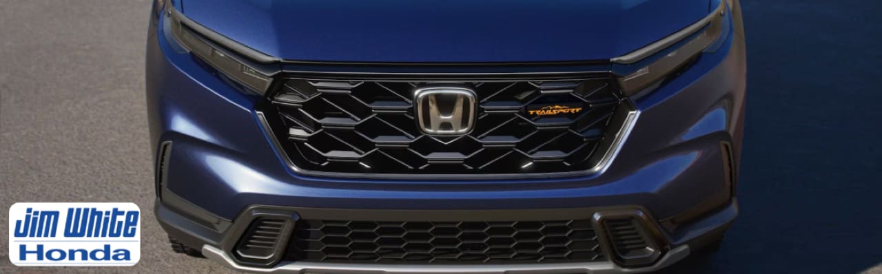 2025%20Honda%20CR-V%20Dealer%20in%20Sylvania%20%20Jim%20White%20Honda.png Customer viewing the new 2025 Honda CR-V Hybrid Sport model at Jim White Honda in Sylvania, OH.