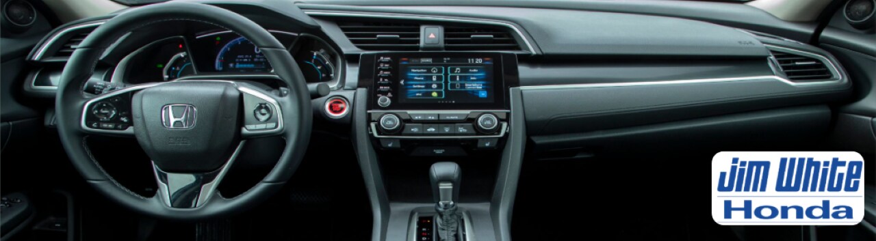 Interior of a certified pre-owned Honda SUV, highlighting the clean cabin and infotainment system.