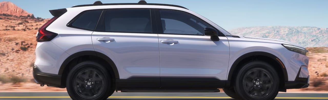 Customer test-driving a used Honda CR-V near Toledo, OH at Jim White Honda