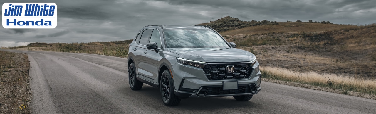 Used Honda CR-V SUV parked at Jim White Honda dealership
