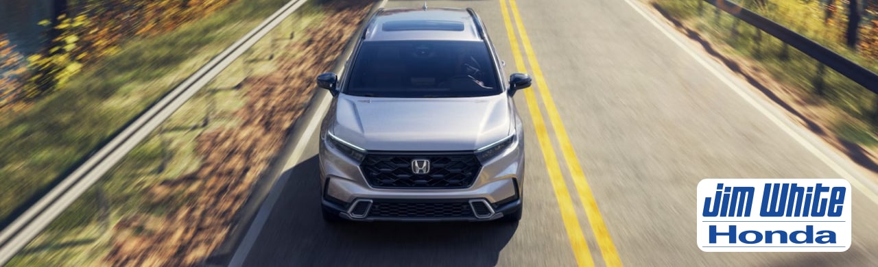 Honda CR-V SUVs lined up outside Jim White Honda dealership in Maumee, Ohio, near Toledo.