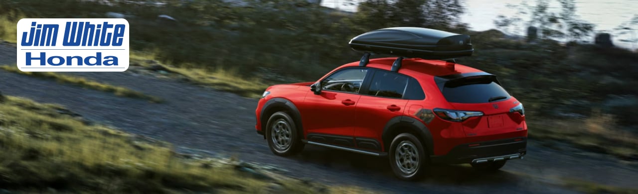 What%E2%80%99s%20New%20in%20the%202026%20Honda%20HR-V%20Compact%20SUV1.png 2026 Honda HR-V compact SUV parked outside Jim White Honda dealership in Toledo, Ohio