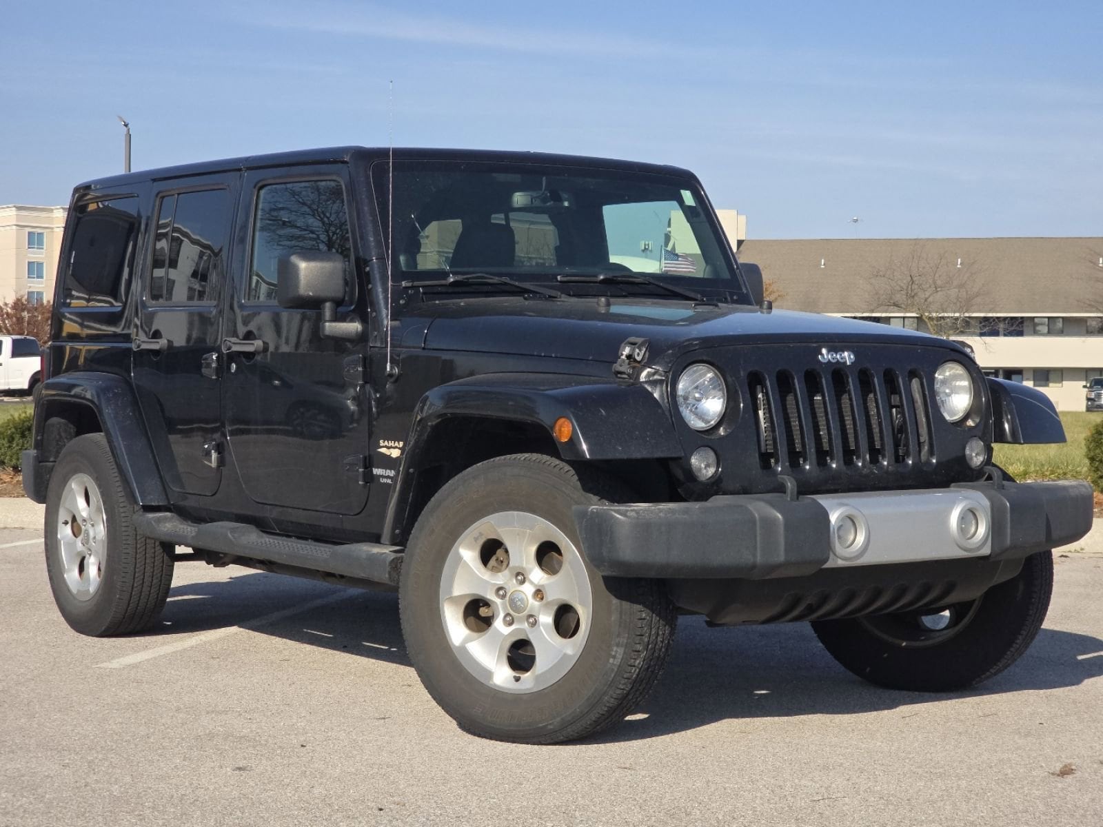 Used 2014 Jeep Wrangler Unlimited Sahara with VIN 1C4HJWEG8EL263061 for sale in Maumee, OH