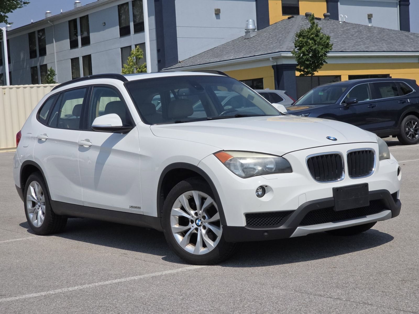 Used 2014 BMW X1 28i with VIN WBAVL1C58EVY13507 for sale in Maumee, OH