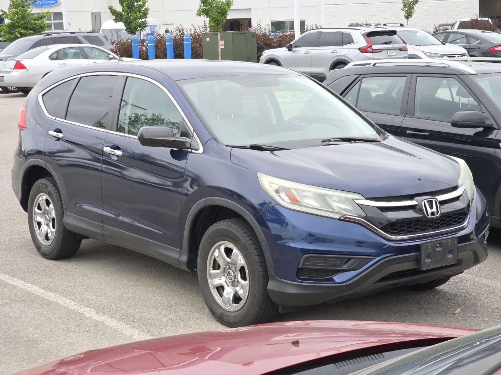 Used 2015 Honda CR-V LX with VIN 3CZRM3H34FG706656 for sale in Maumee, OH