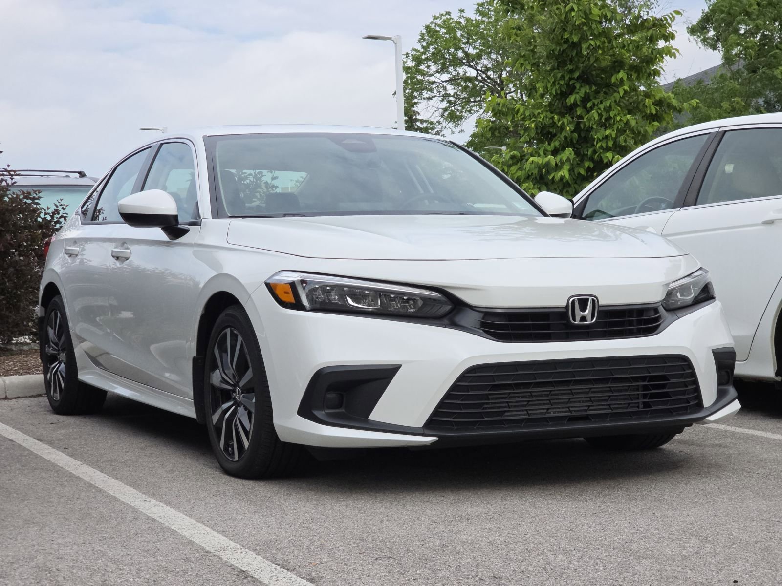 Certified 2022 Honda Civic EX with VIN 2HGFE1F70NH322017 for sale in Maumee, OH
