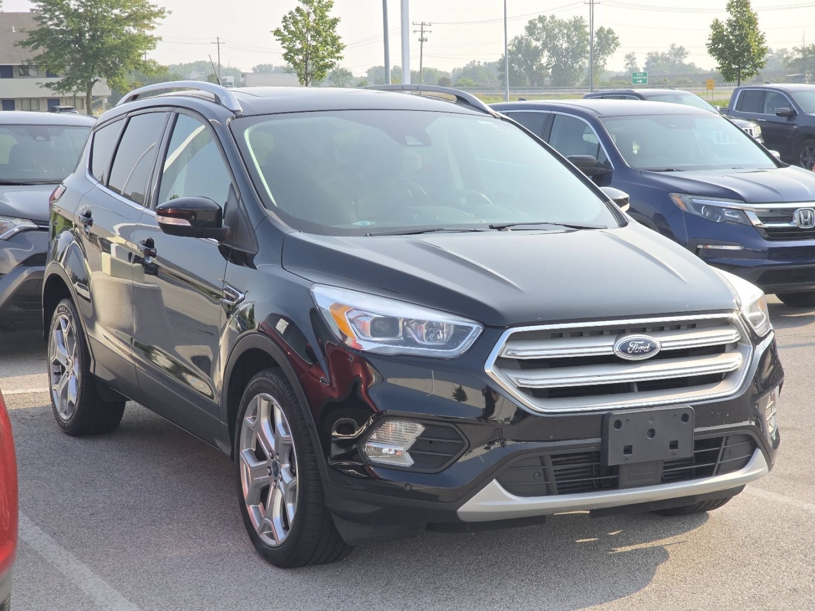 Used 2019 Ford Escape Titanium with VIN 1FMCU9J9XKUA31637 for sale in Maumee, OH