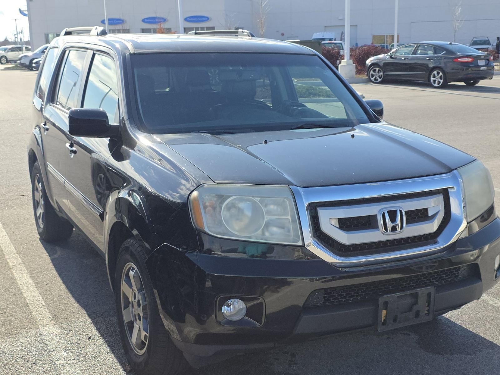 Used 2011 Honda Pilot Touring with VIN 5FNYF4H90BB005098 for sale in Maumee, OH